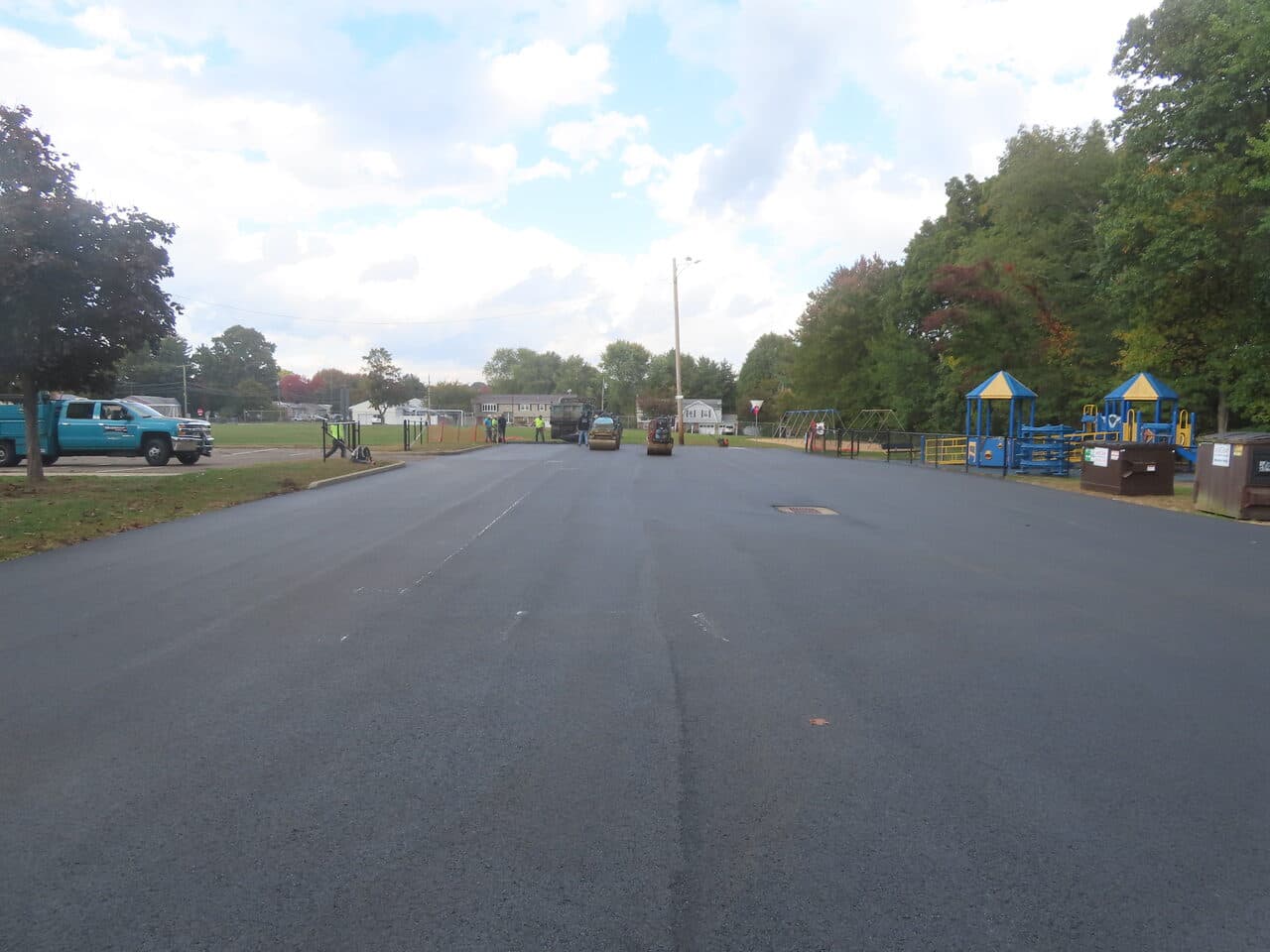 Commercial Parking Lot Paving project in West Haven, CT — finished smooth asphalt by playground