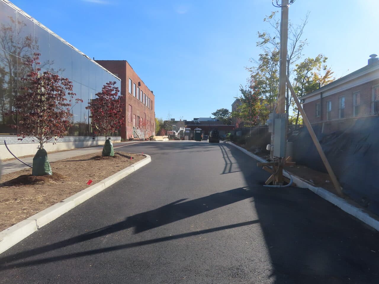 Commercial Parking Lot Paving project in Hartford, CT — finished asphalt drive same area