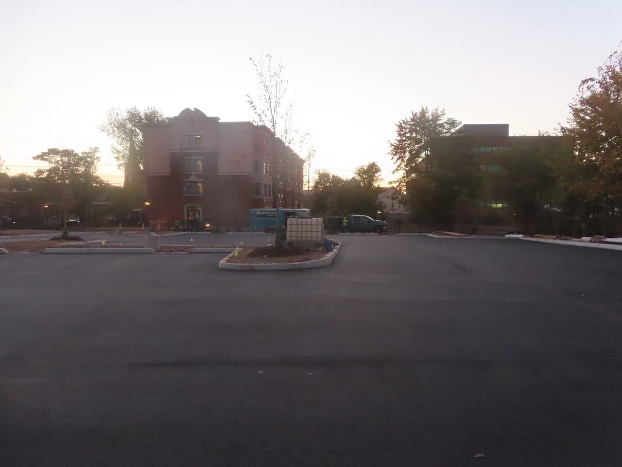 Commercial Parking Lot Paving project in Hartford, CT — finished large lot at sunset