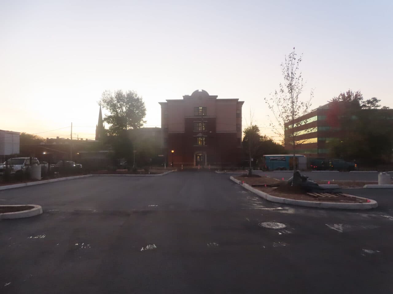 Commercial Parking Lot Paving project in Hartford, CT — finished lot dusk toward building