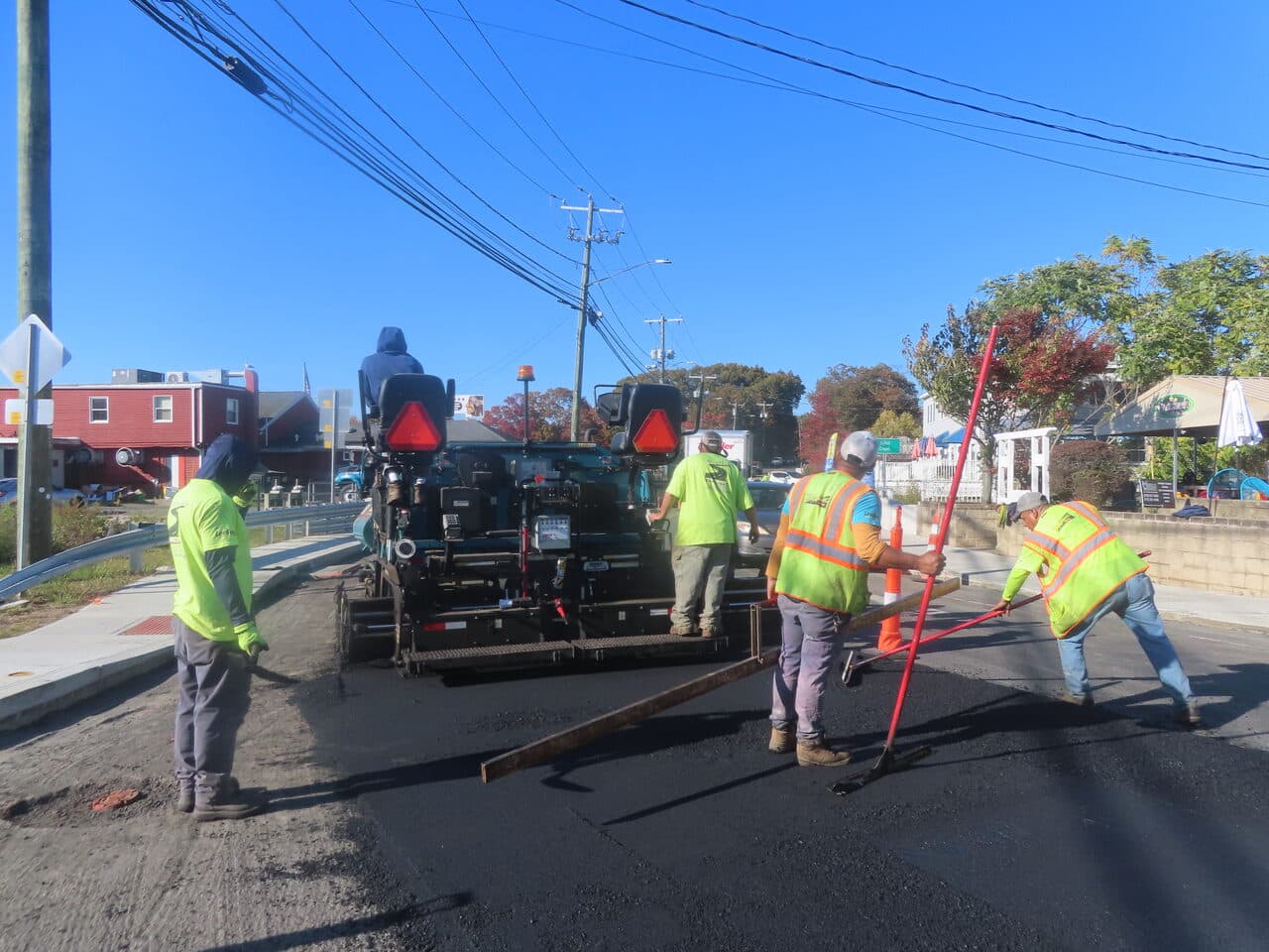 Roadway Paving project in Branford, CT — paving crew laying asphalt behind paver