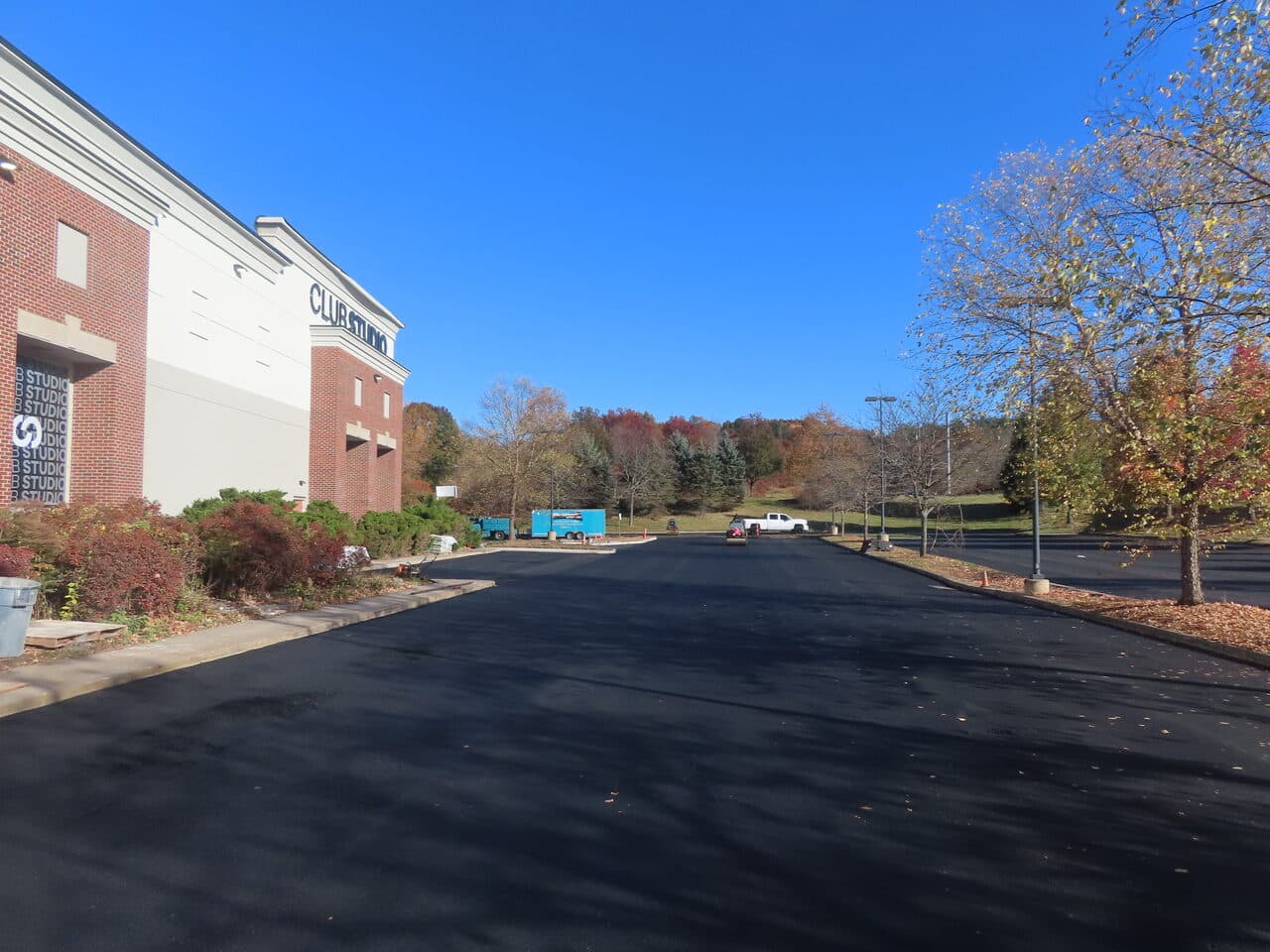 Commercial Parking Lot Paving project in South Windsor, CT — wide finished lot at Club Studio
