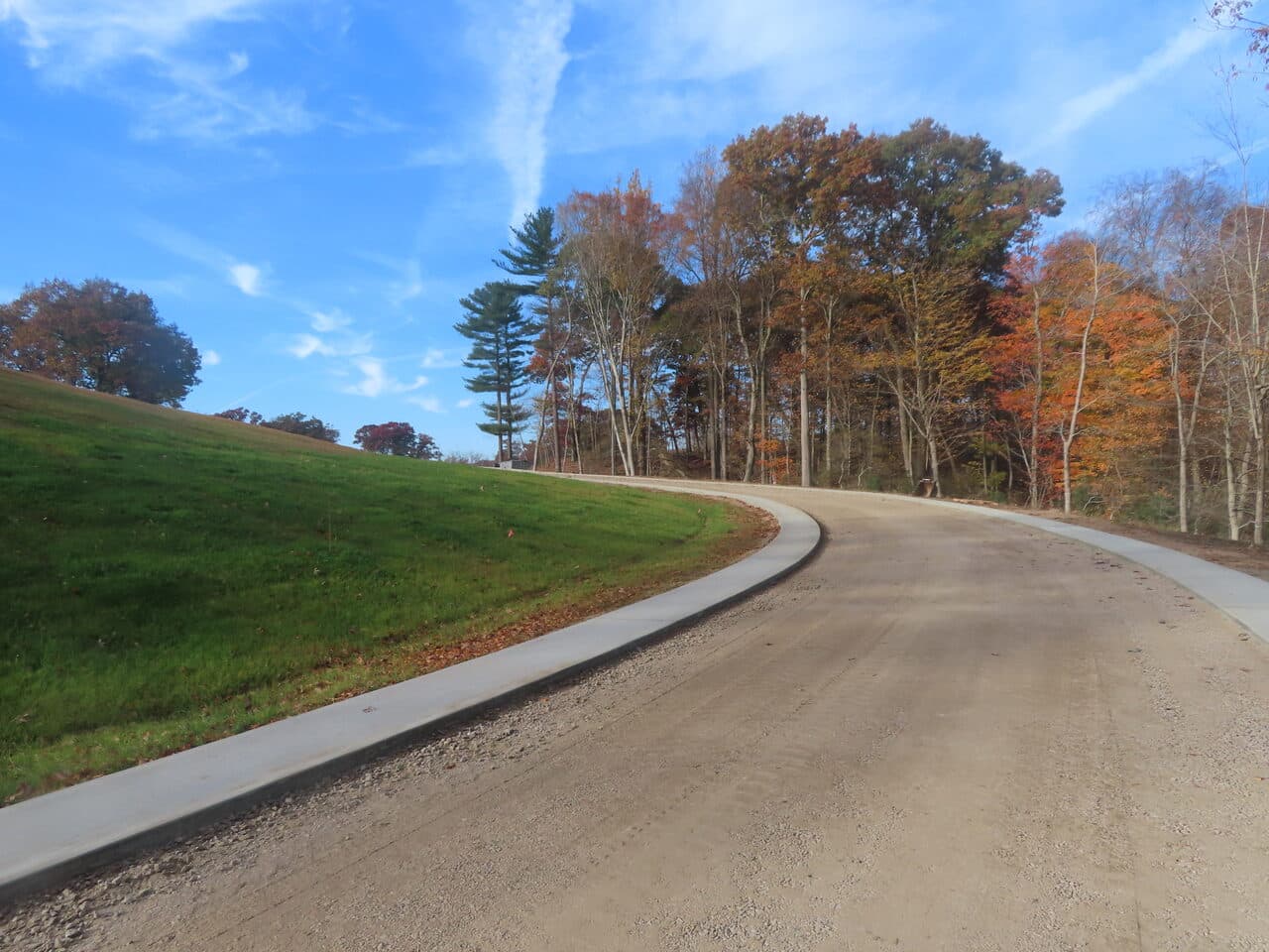 Golf Course Paving project in New Haven, CT — finished curbed cart path through fairway
