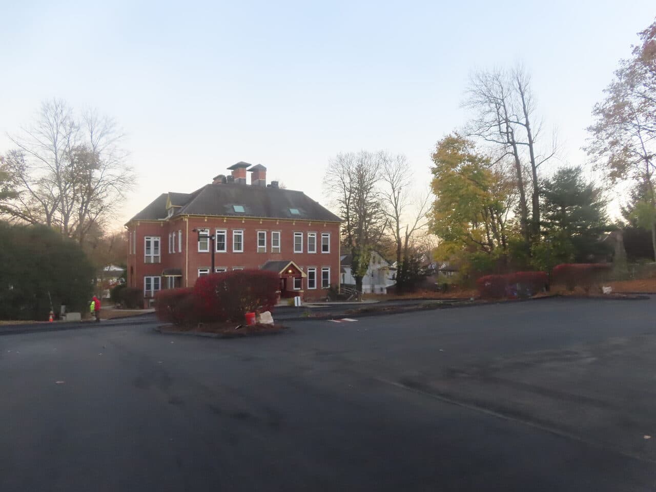 Commercial Parking Lot Paving project in Meriden, CT — finished parking lot at brick building