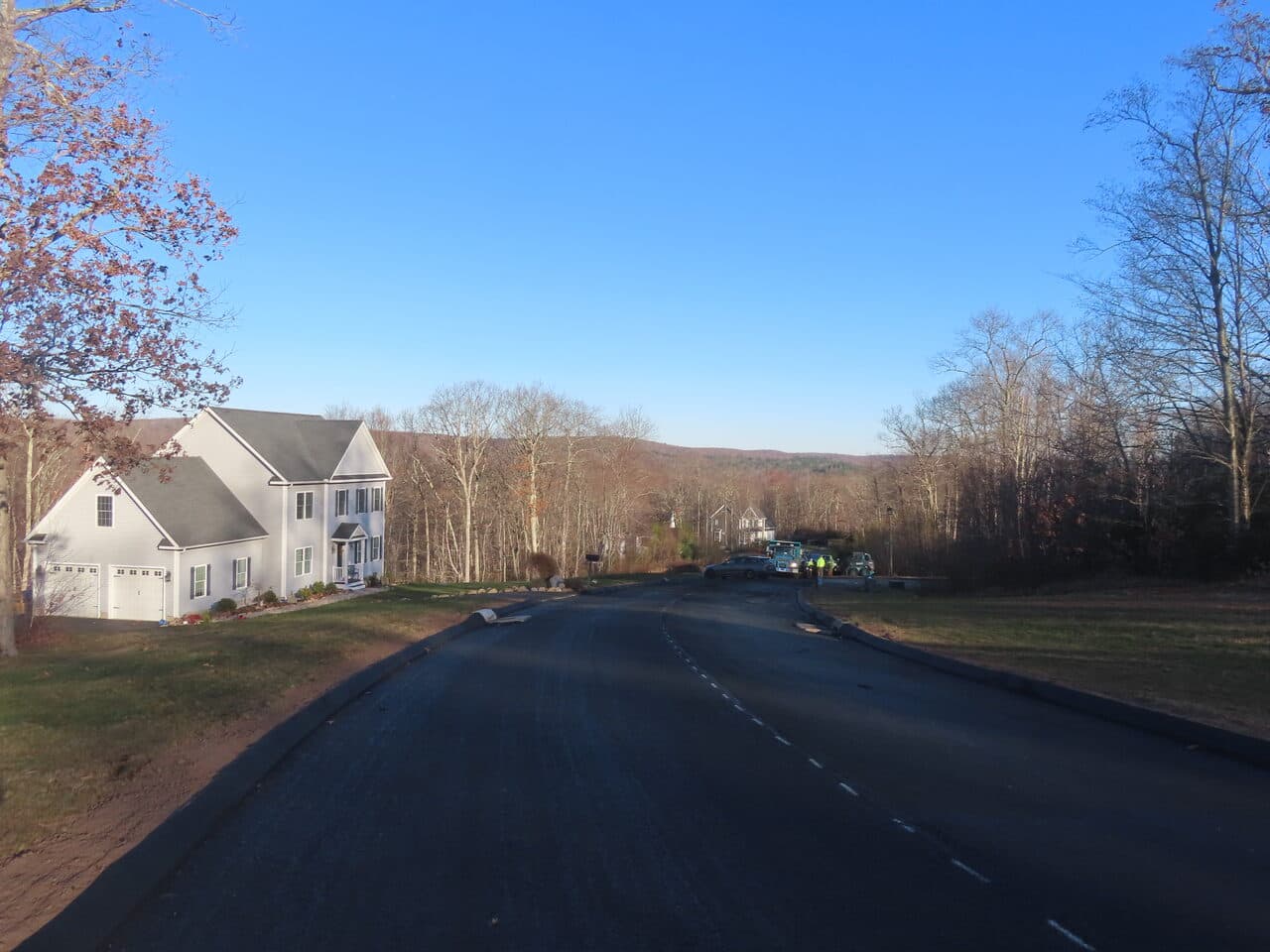 Roadway Paving project in Higganum, CT — finished road blue sky
