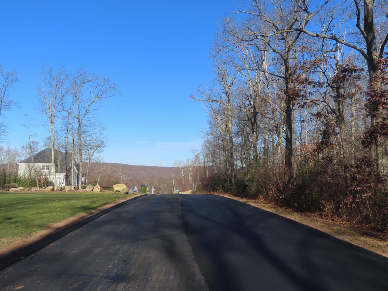Roadway Paving project in Higganum, CT — finished new road curve