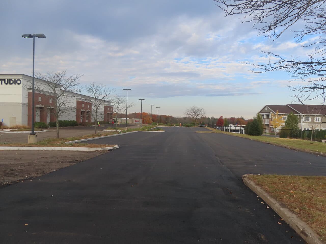 Commercial Parking Lot Paving project in South Windsor, CT — finished asphalt drive aisle commercial