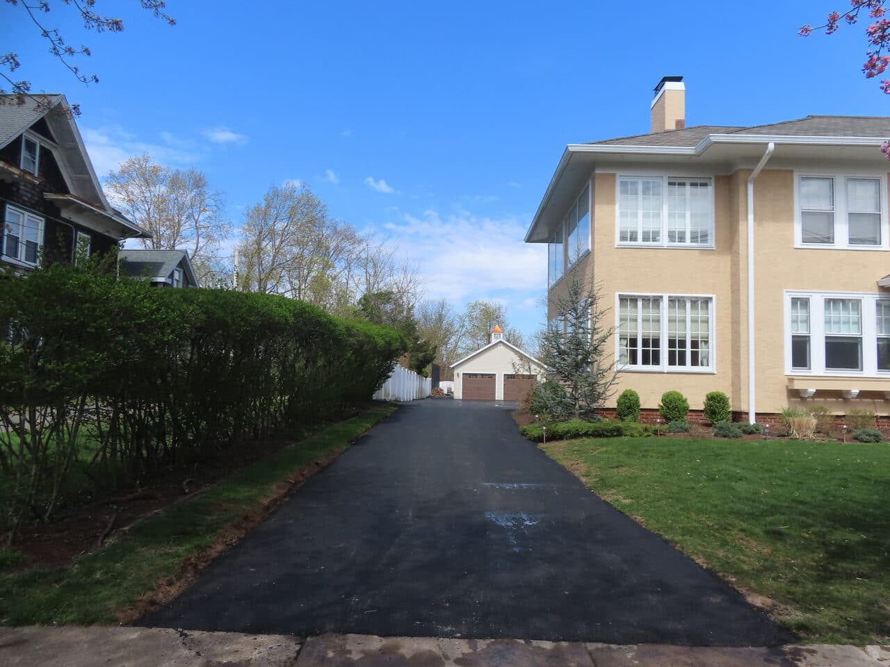 Multi-Stop Residential Driveway Paving project in Wallingford, Branford & Northford, CT — new driveway alongside home