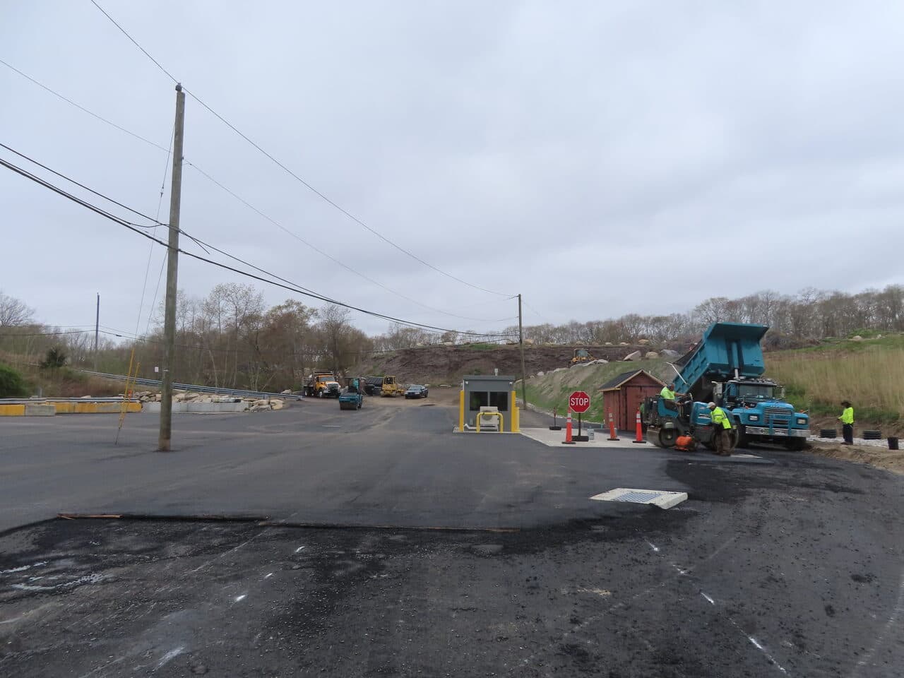 Commercial Parking Lot Paving project in East Lyme, CT — wide view new asphalt entrance area