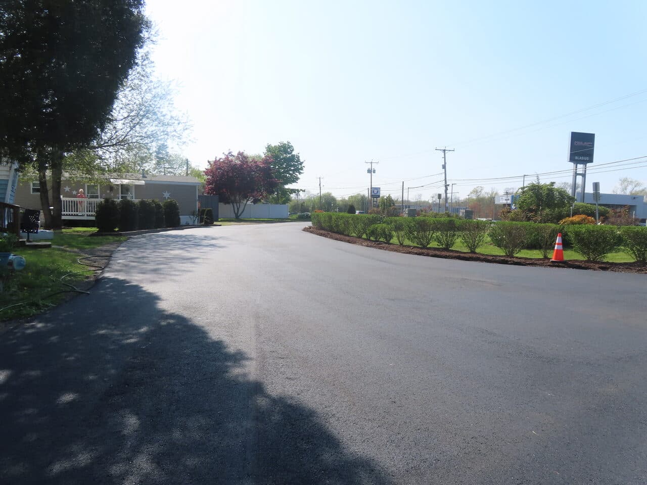 Commercial Parking Lot Paving project in Branford, CT — freshly paved private road