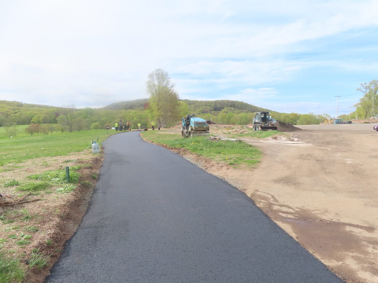 Golf Course Cart Path Paving project in Hamden, CT — new paved cart path with equipment