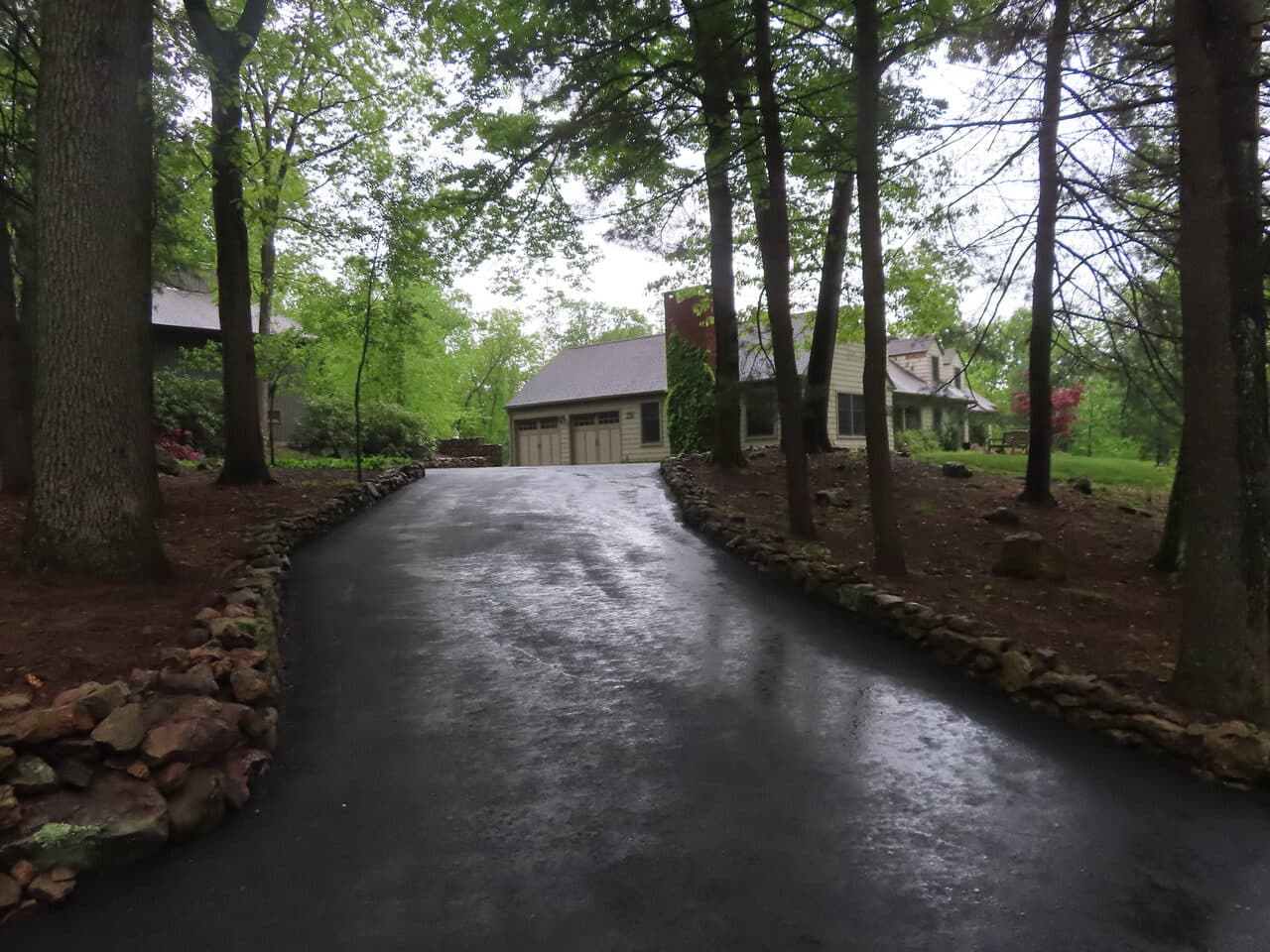Residential Driveway Paving project in Hamden, CT — long driveway approach to garage