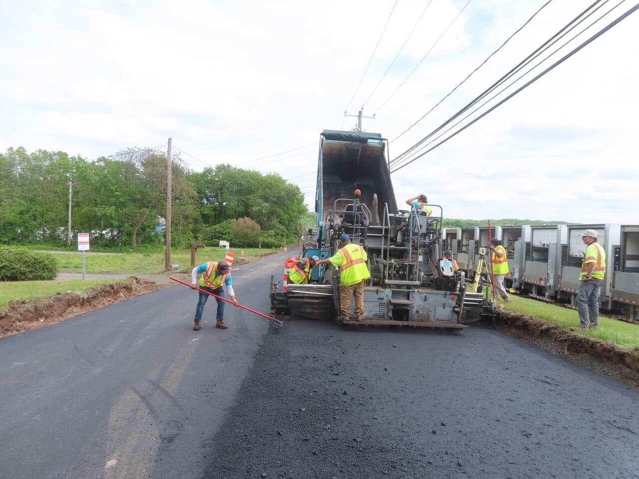Roadway Paving project in Cheshire, CT — crew operating asphalt paver