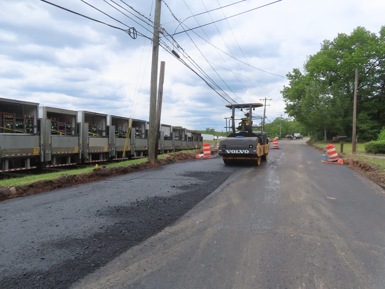 Roadway Paving project in Cheshire, CT — Volvo roller compacting new asphalt