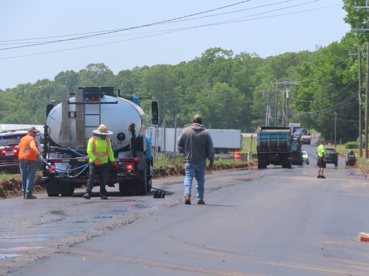 Roadway Paving project in Cheshire, CT — crew with tanker on road