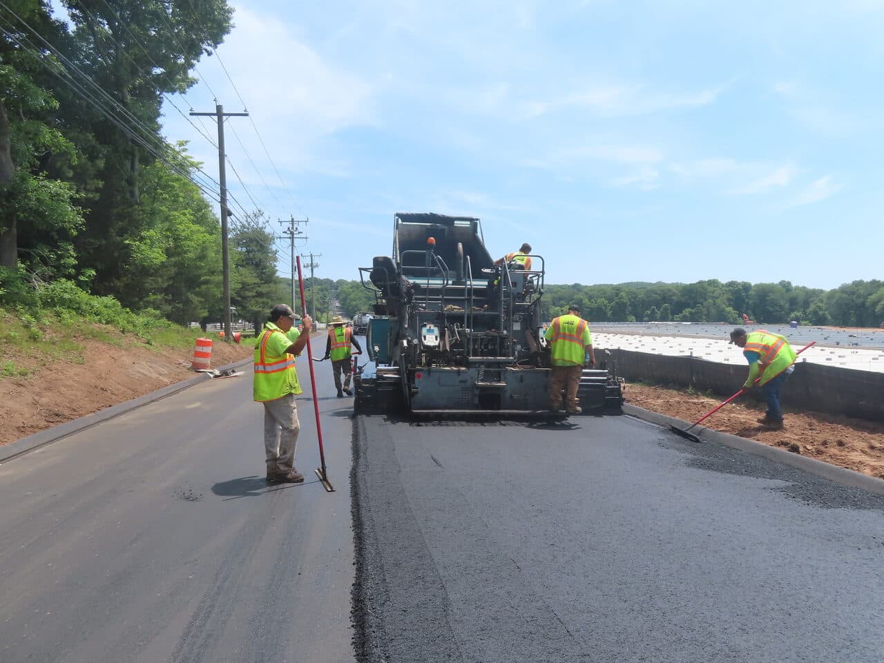 Roadway Paving project in Cheshire, CT — asphalt paving operation on roadway