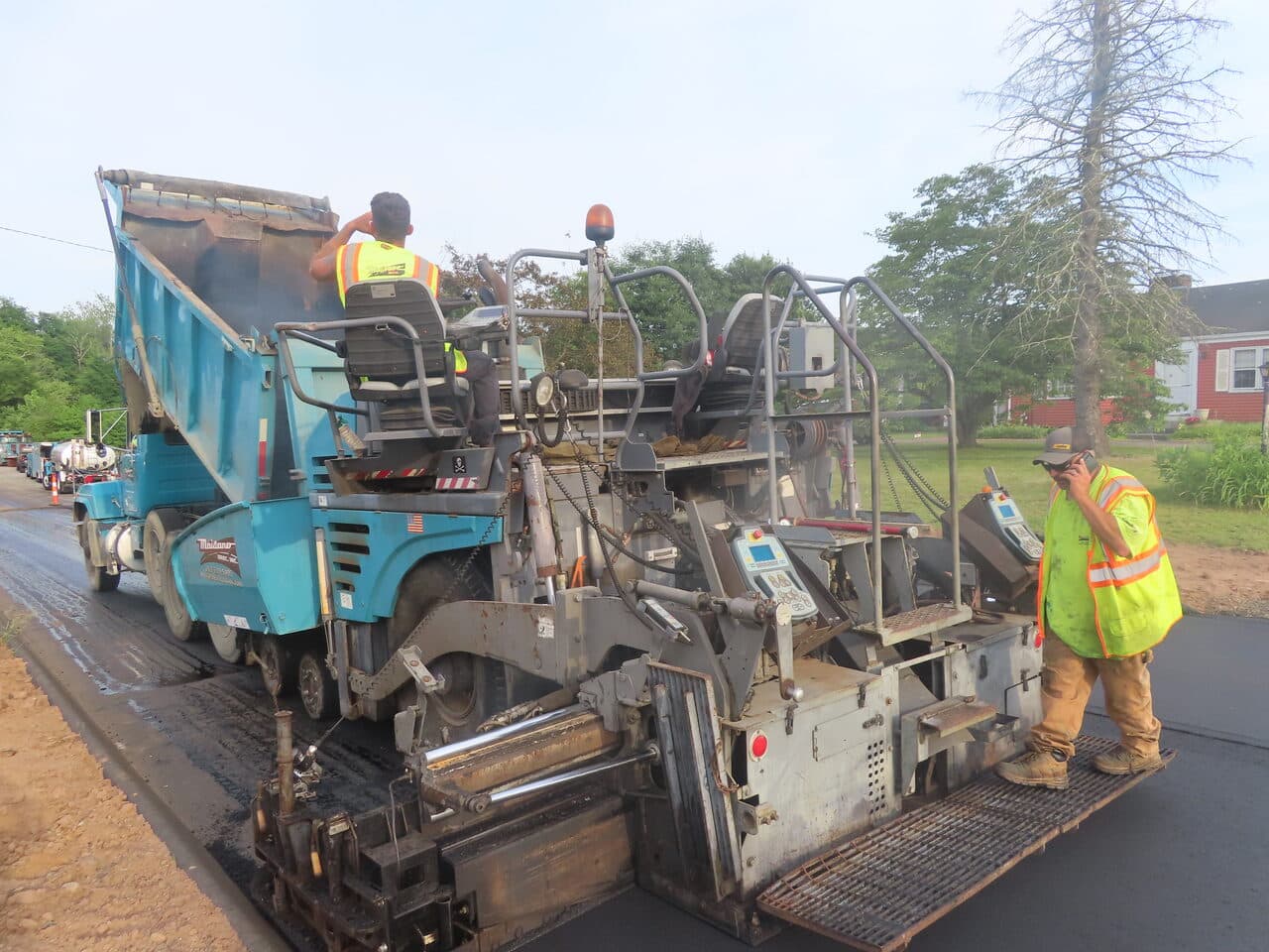 Roadway Paving project in Cheshire, CT — asphalt paver machine close up
