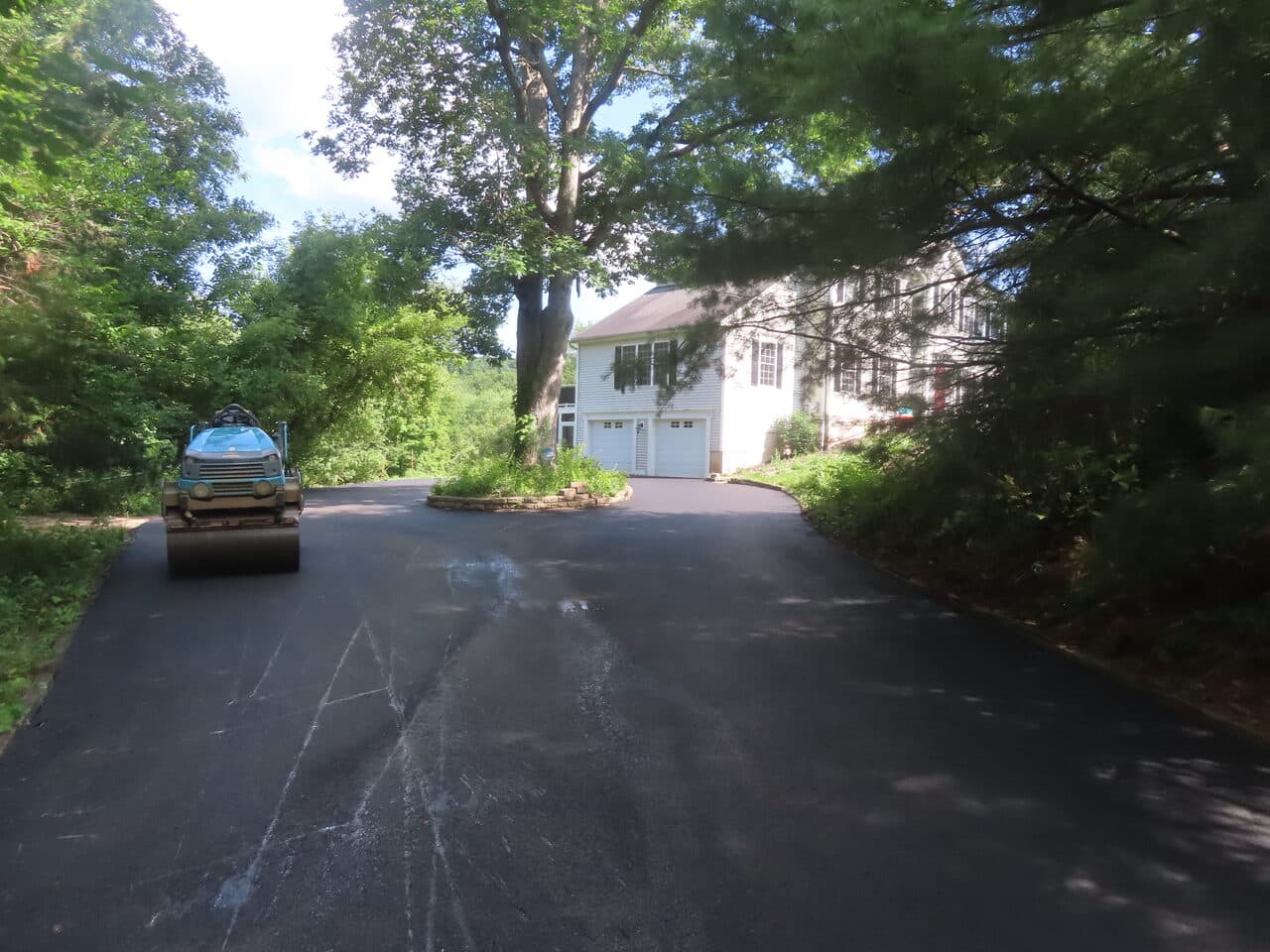After — Multi-Stop Residential Driveway Paving in Durham & Wallingford, CT (worn driveway before paving)