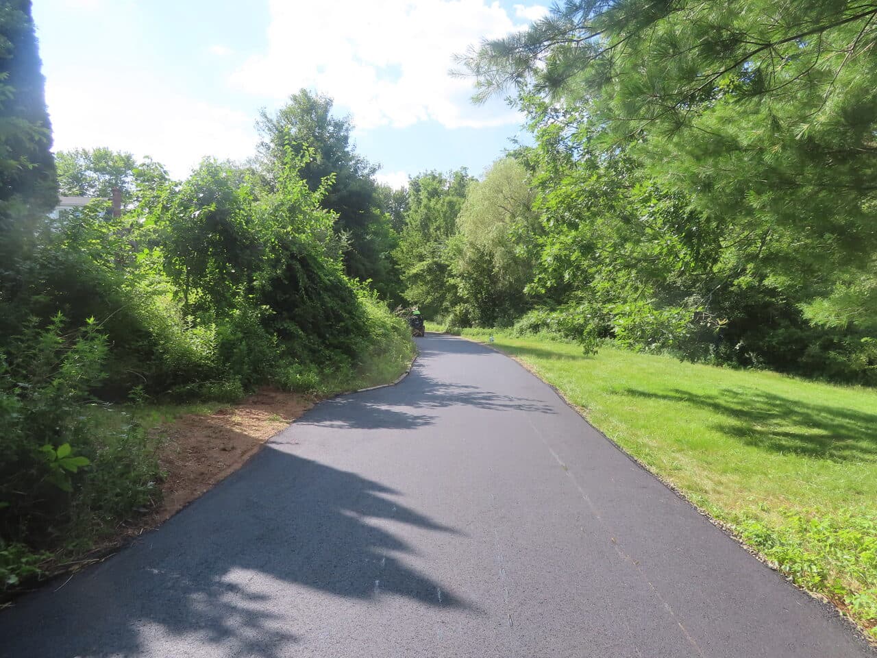 Before — Multi-Stop Residential Driveway Paving in Durham & Wallingford, CT (worn driveway before paving)