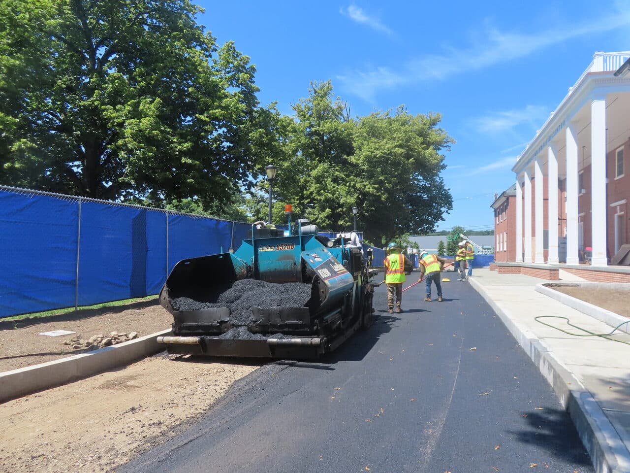 Institutional Asphalt Paving project in New Haven, CT — paver laying asphalt mat
