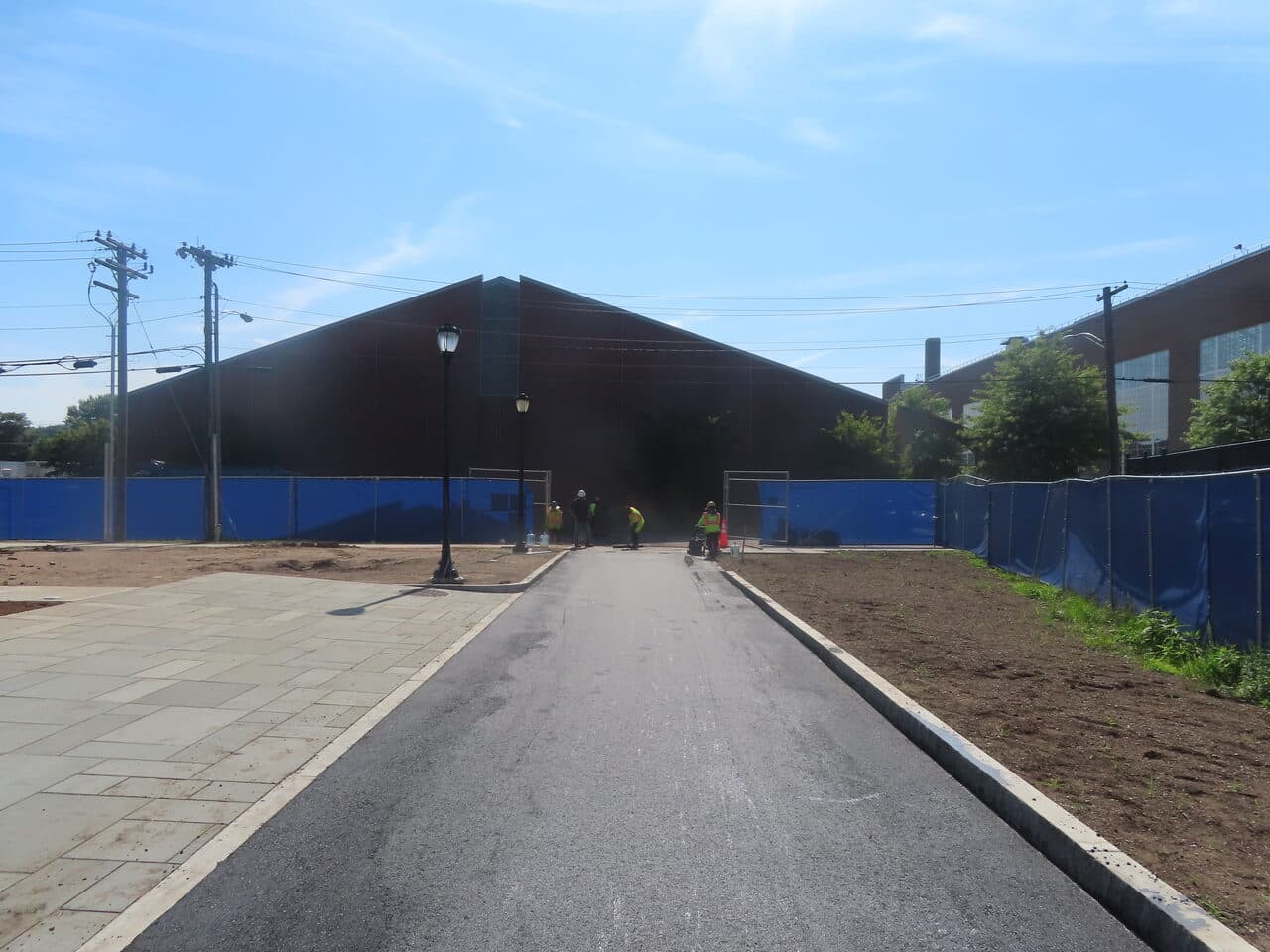 Institutional Asphalt Paving project in New Haven, CT — paved path with new pavers and curbs