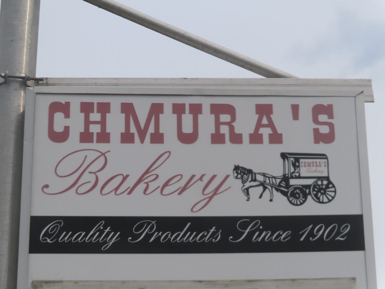 Commercial Parking Lot Paving project in Springfield, MA — Chmura's Bakery business sign