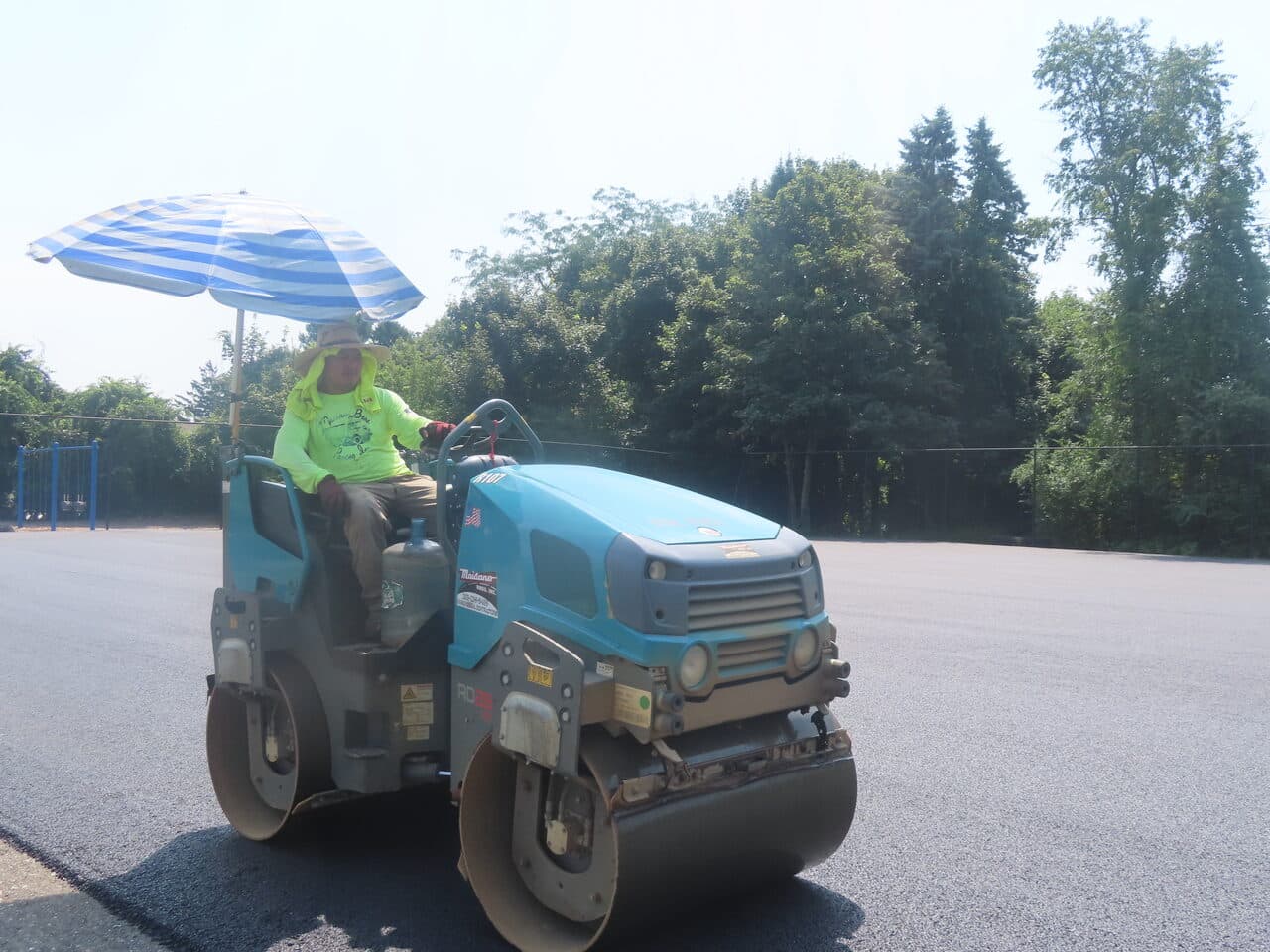 Commercial Parking Lot Paving project in Barrington, RI — double drum roller on asphalt