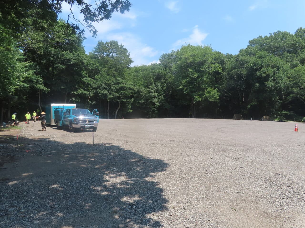 Commercial Parking Lot Paving project in Barrington, RI — gravel base with service truck