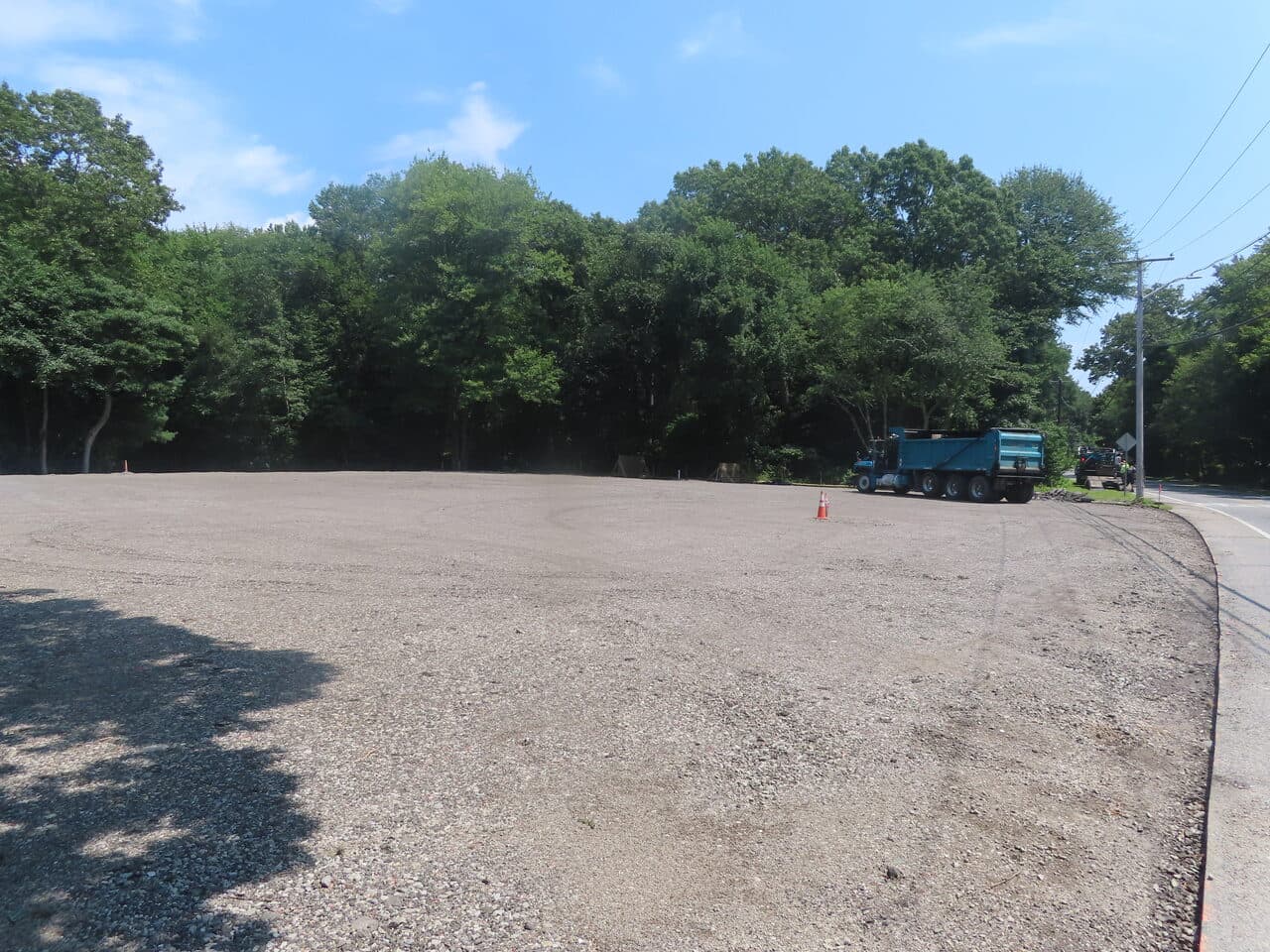 Before — Commercial Parking Lot Paving in Barrington, RI (graded gravel base before paving)