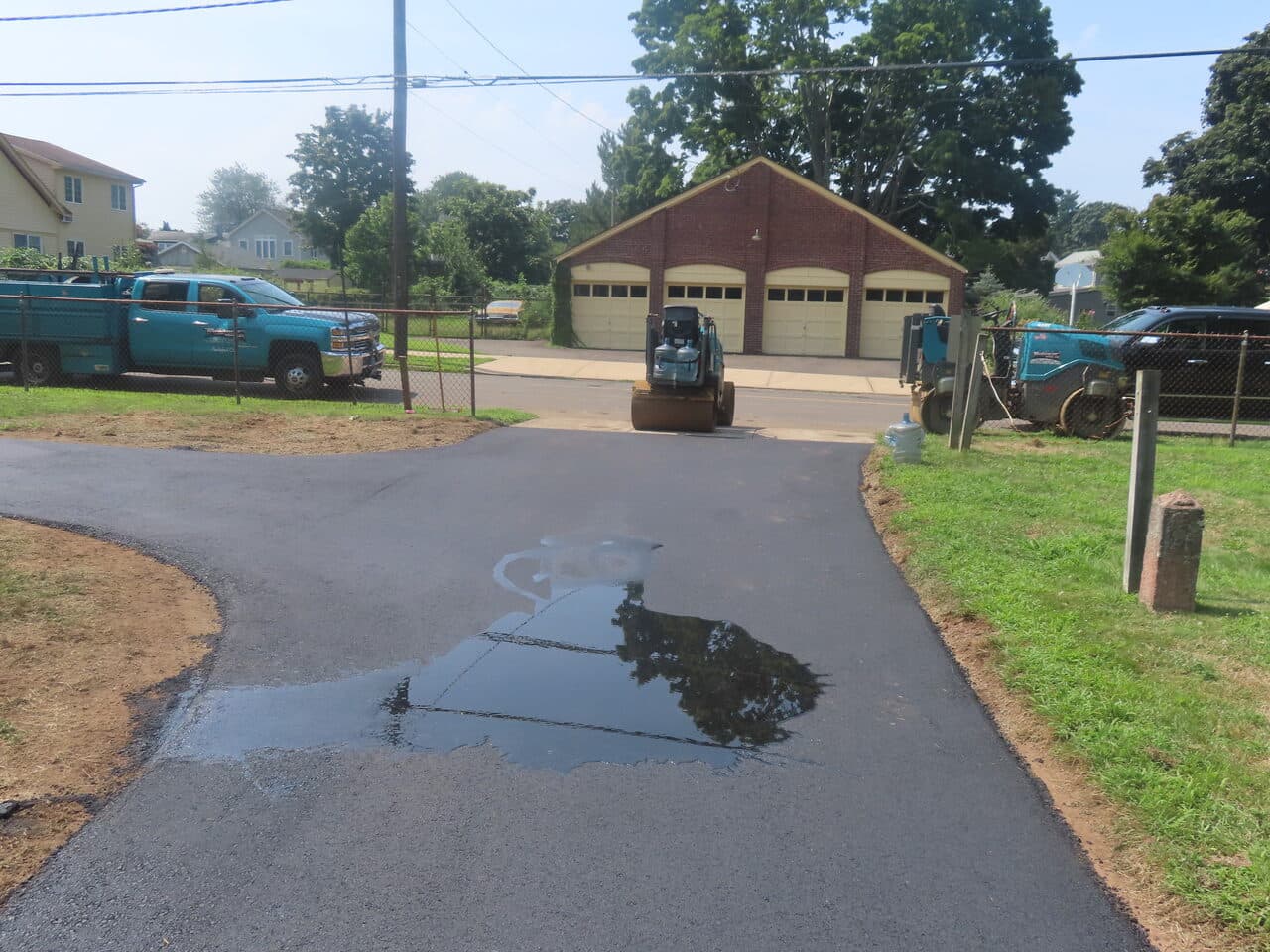 Cemetery Roadway & Walkway Paving project in East Haven, CT — fresh paved drive to garage