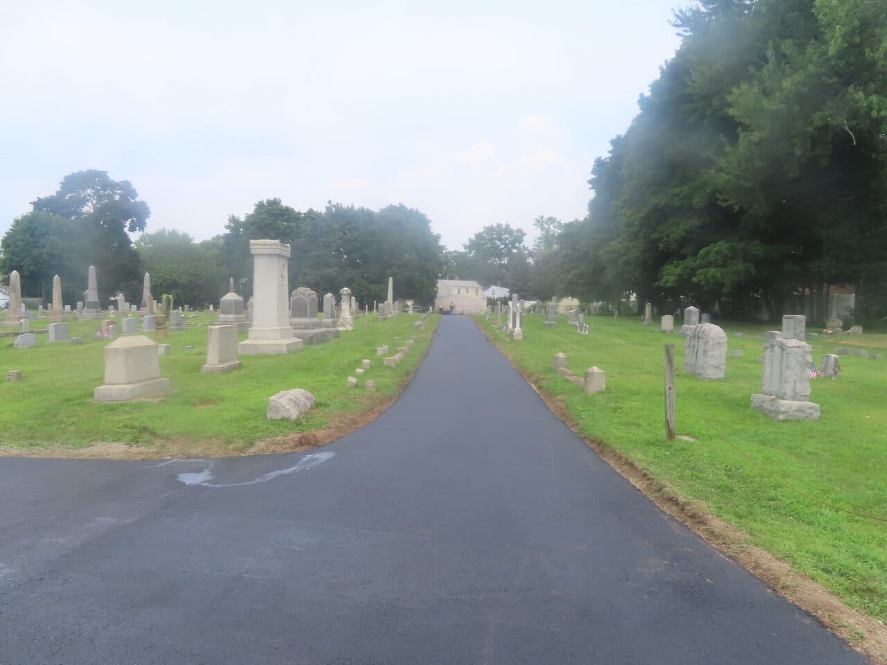 Cemetery Roadway & Walkway Paving project in East Haven, CT — finished paved lane through cemetery