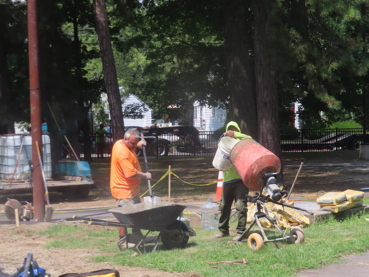 Commercial Parking Lot Paving project in Springfield, MA — workers at concrete mixer