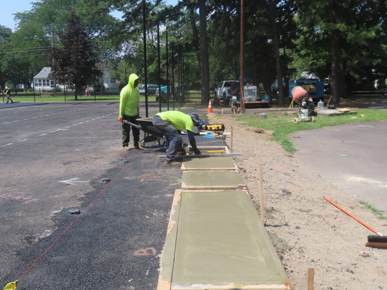 Commercial Parking Lot Paving project in Springfield, MA — finishing concrete walkway forms