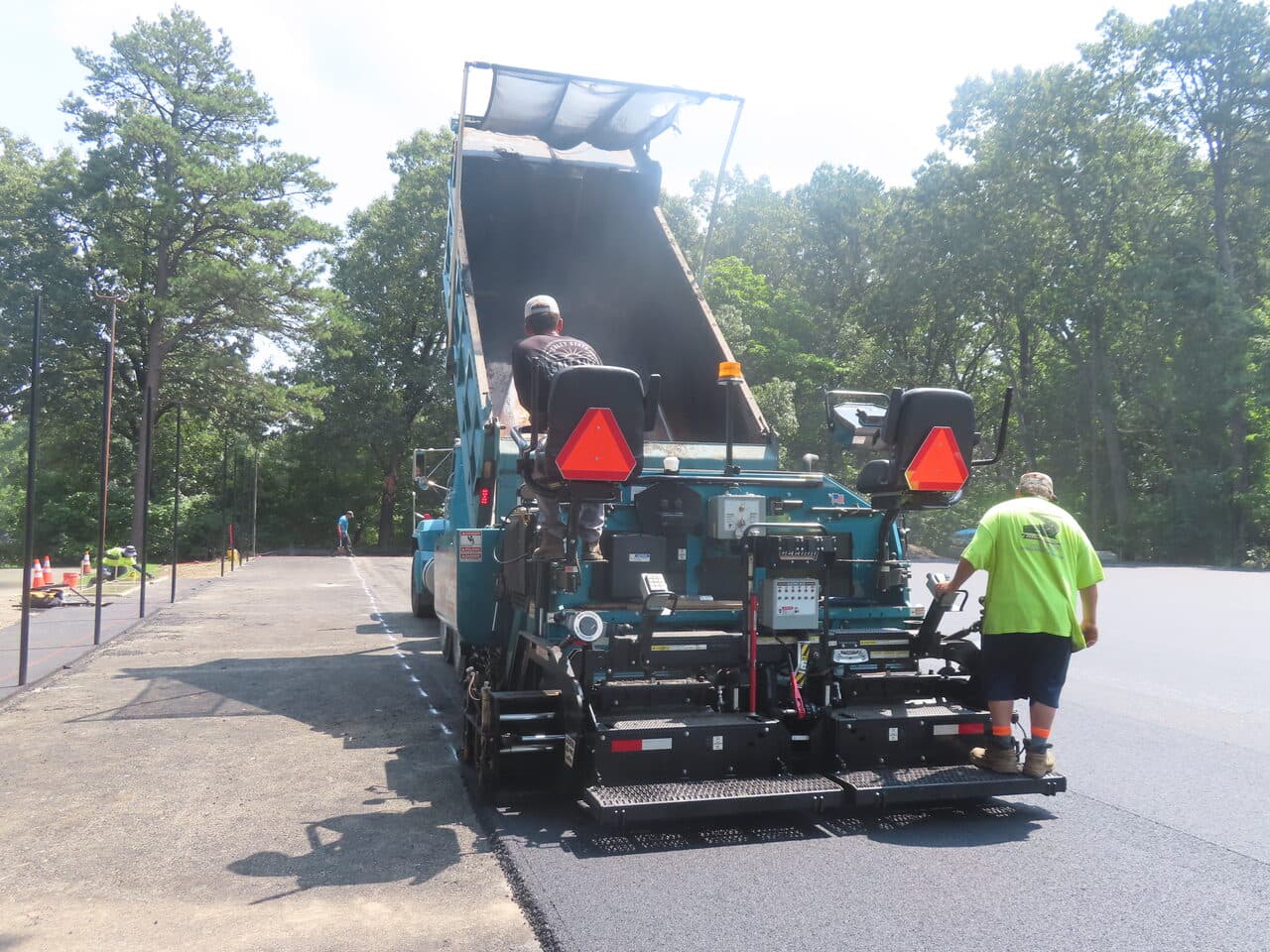 Commercial Parking Lot Paving project in Springfield, MA — paver rear view loading