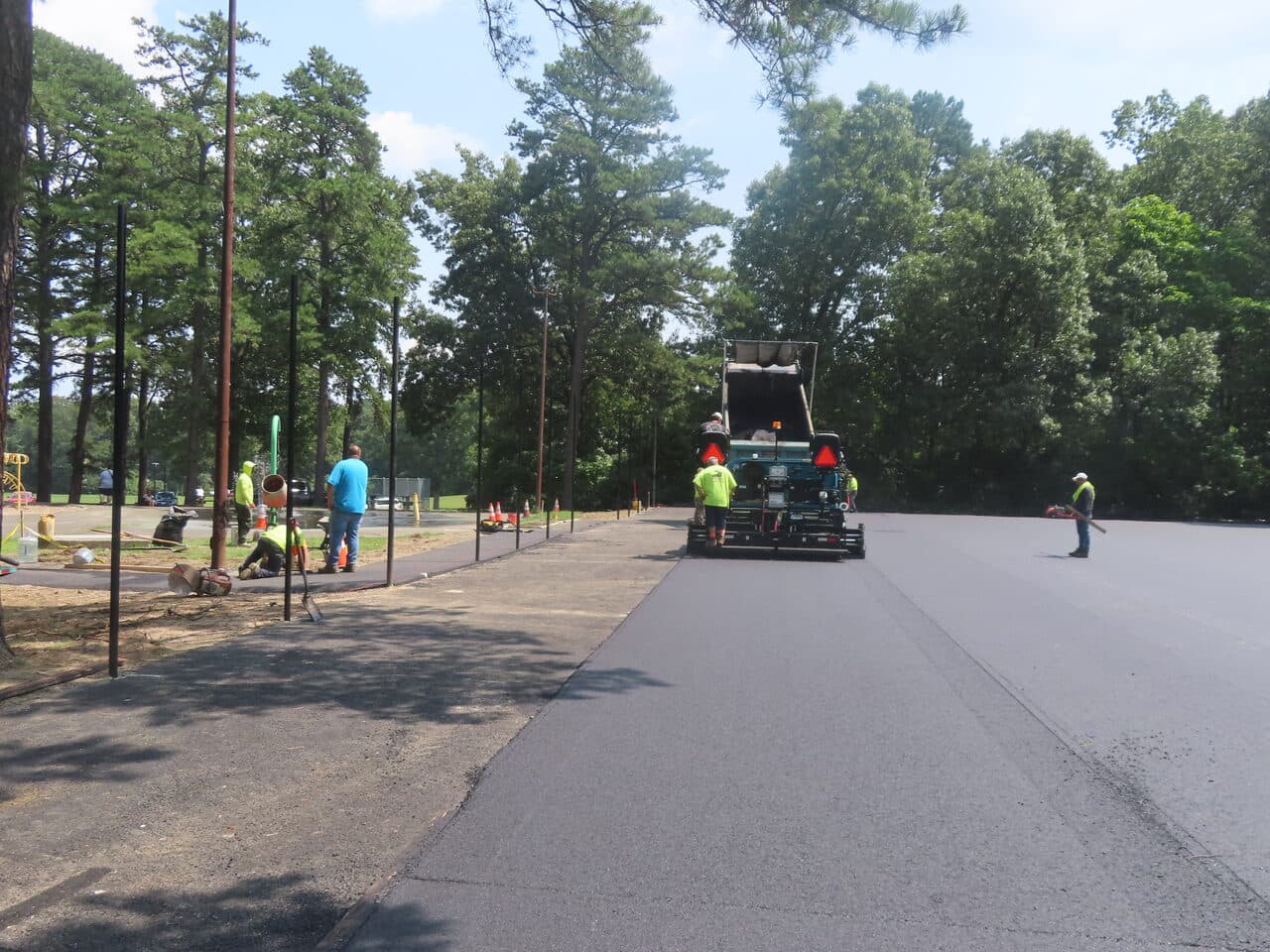 Commercial Parking Lot Paving project in Springfield, MA — fresh asphalt paving in progress