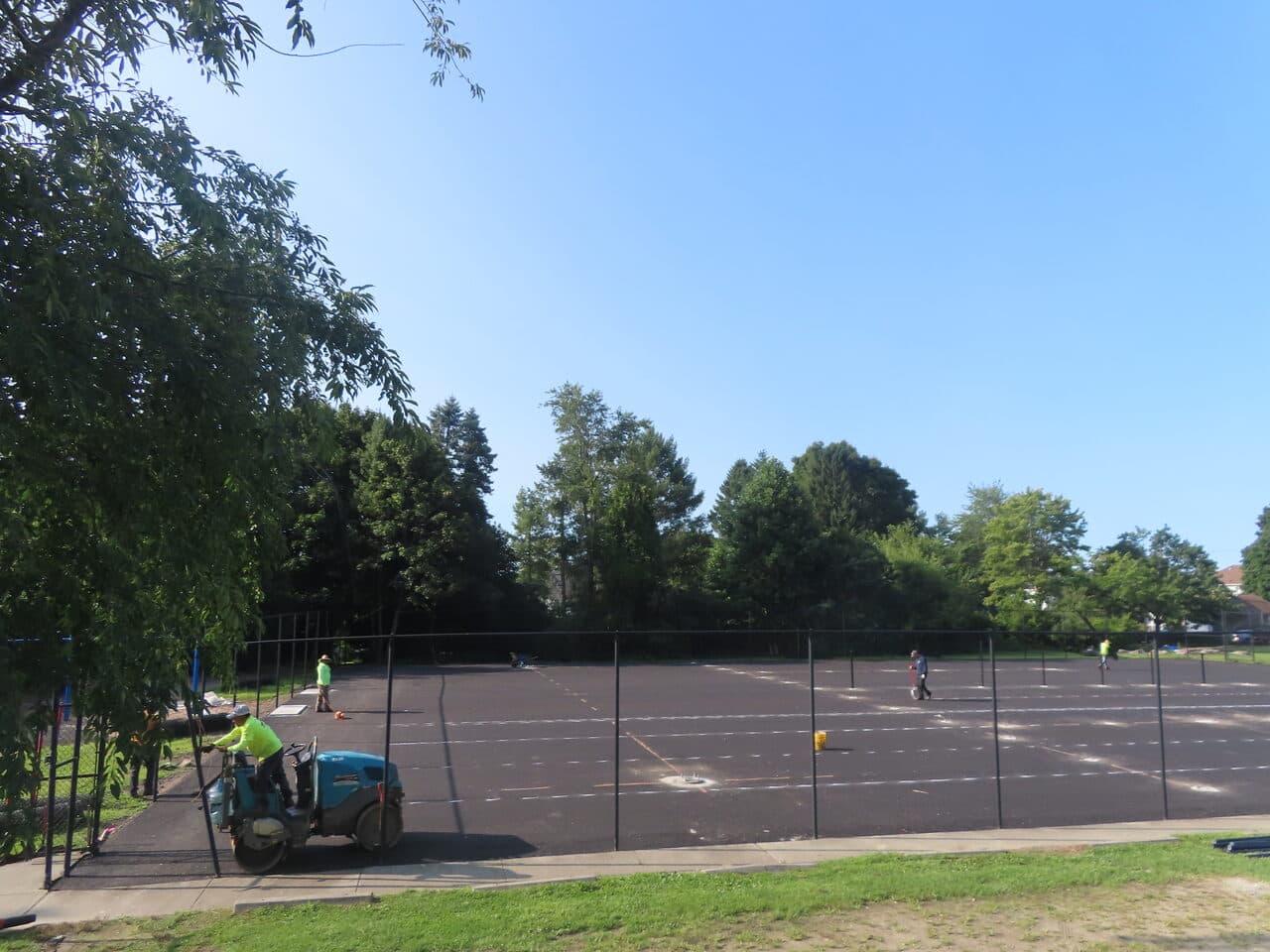 Commercial Parking Lot Paving project in Barrington, RI — fresh base asphalt across lot