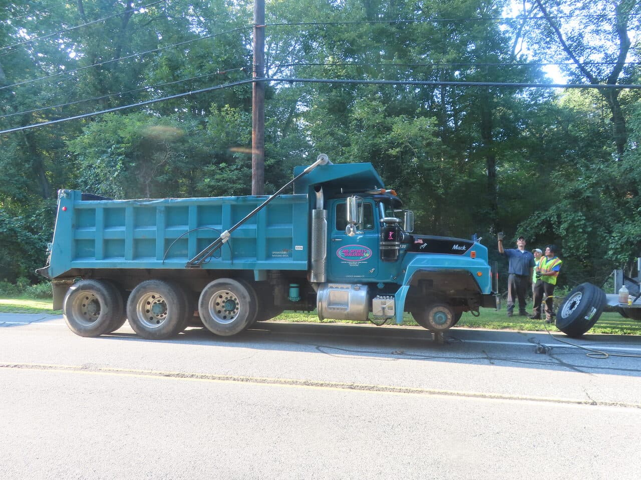 Commercial Parking Lot Paving project in Barrington, RI — dump truck roadside profile
