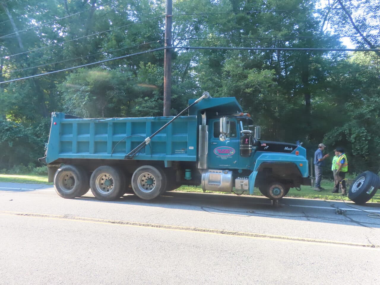 Commercial Parking Lot Paving project in Barrington, RI — dump truck roadside profile