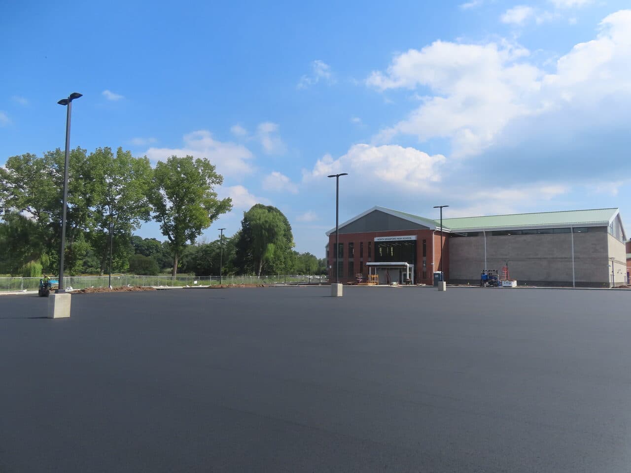 Commercial Parking Lot Paving project in North Branford, CT — finished asphalt lot at high school