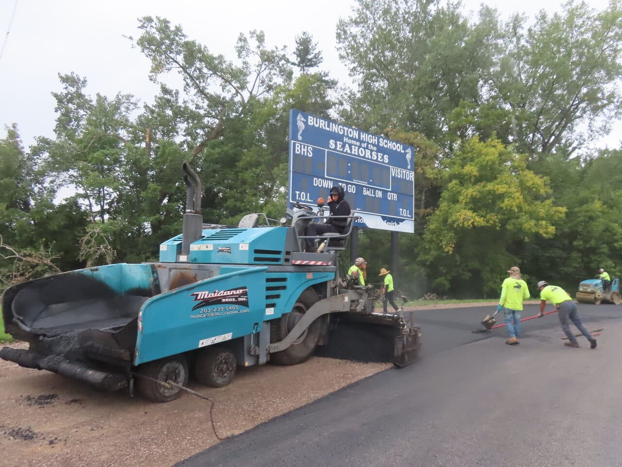 Athletic Surface Base Paving project in Burlington, VT — Maisano paver and scoreboard