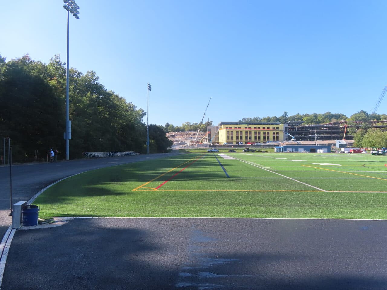 Athletic Surface Base Paving project in Burlington, VT — finished track around turf field