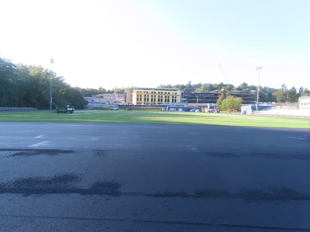 Athletic Surface Base Paving project in Burlington, VT — finished track view to campus