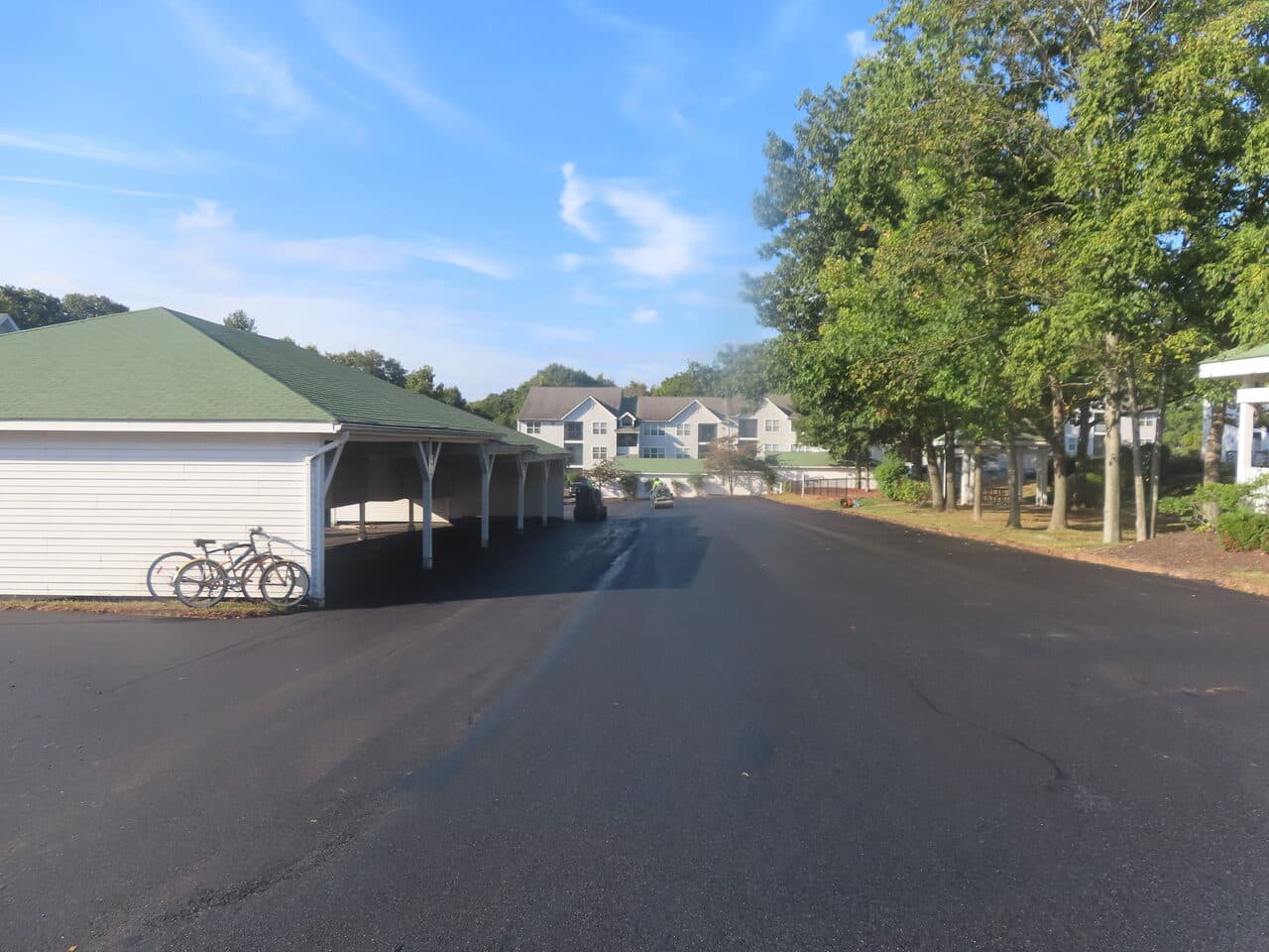 HOA Parking Lot Paving project in Hamden, CT — finished asphalt drive at complex