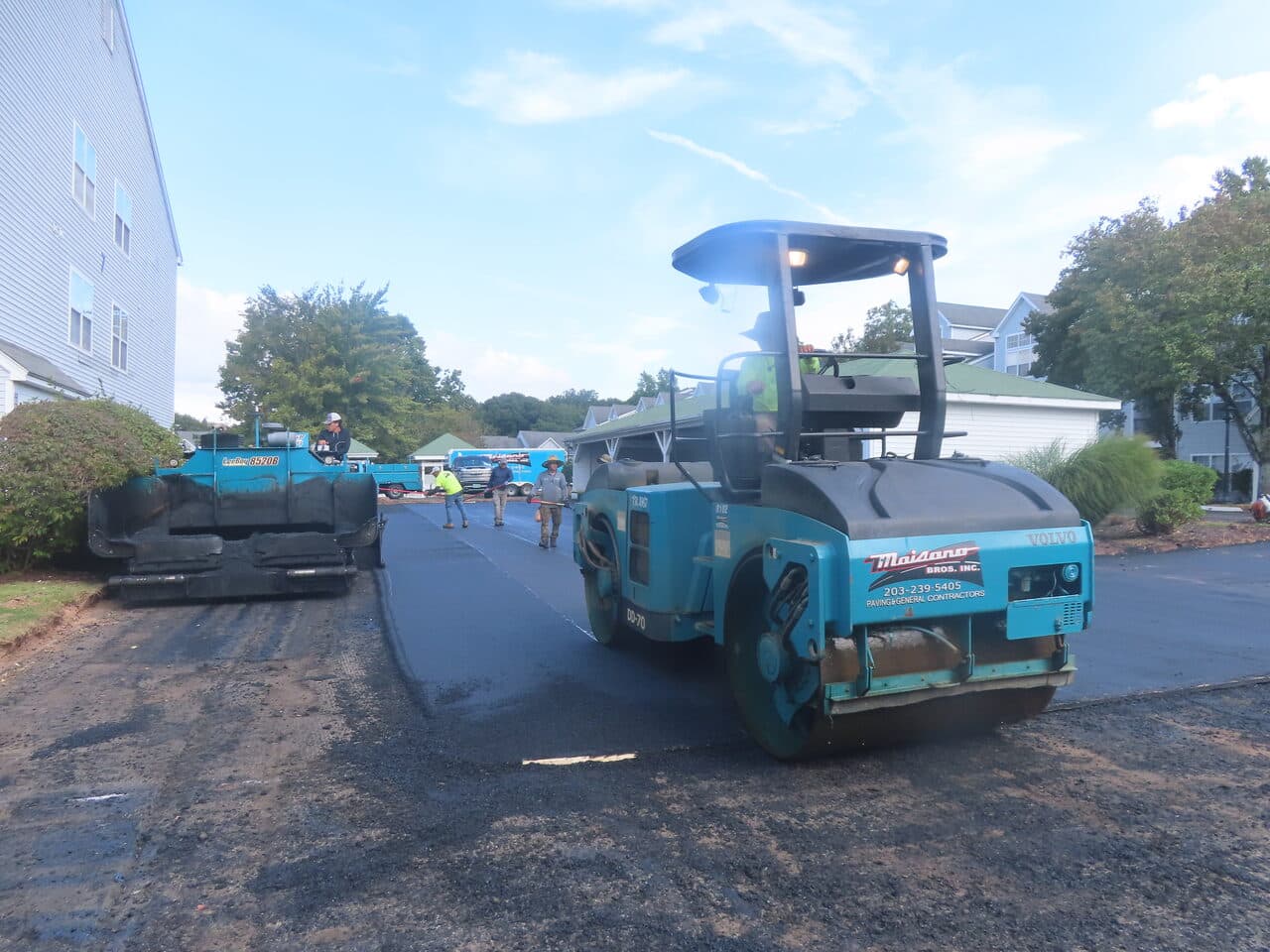 HOA Parking Lot Paving project in Hamden, CT — Maisano roller compacting new asphalt