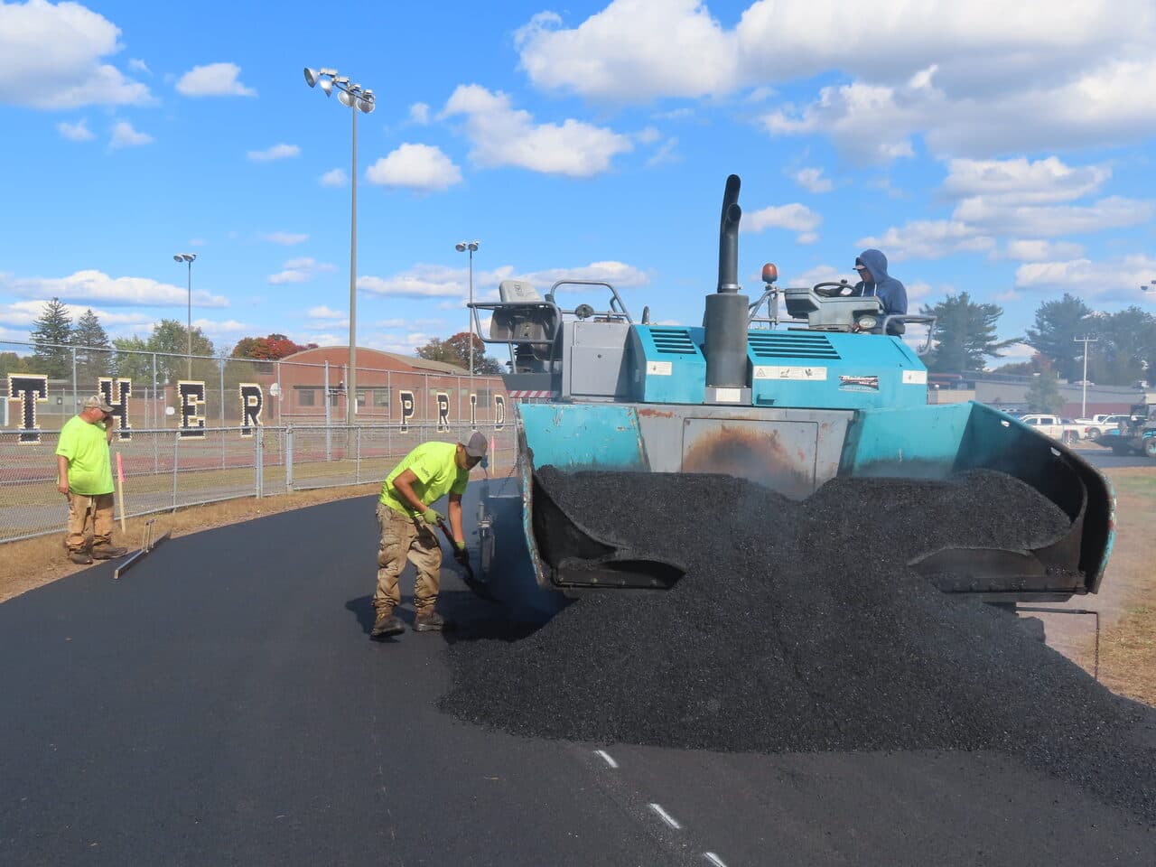 Athletic Surface Base Paving project in East Windsor, CT — paver laying track asphalt
