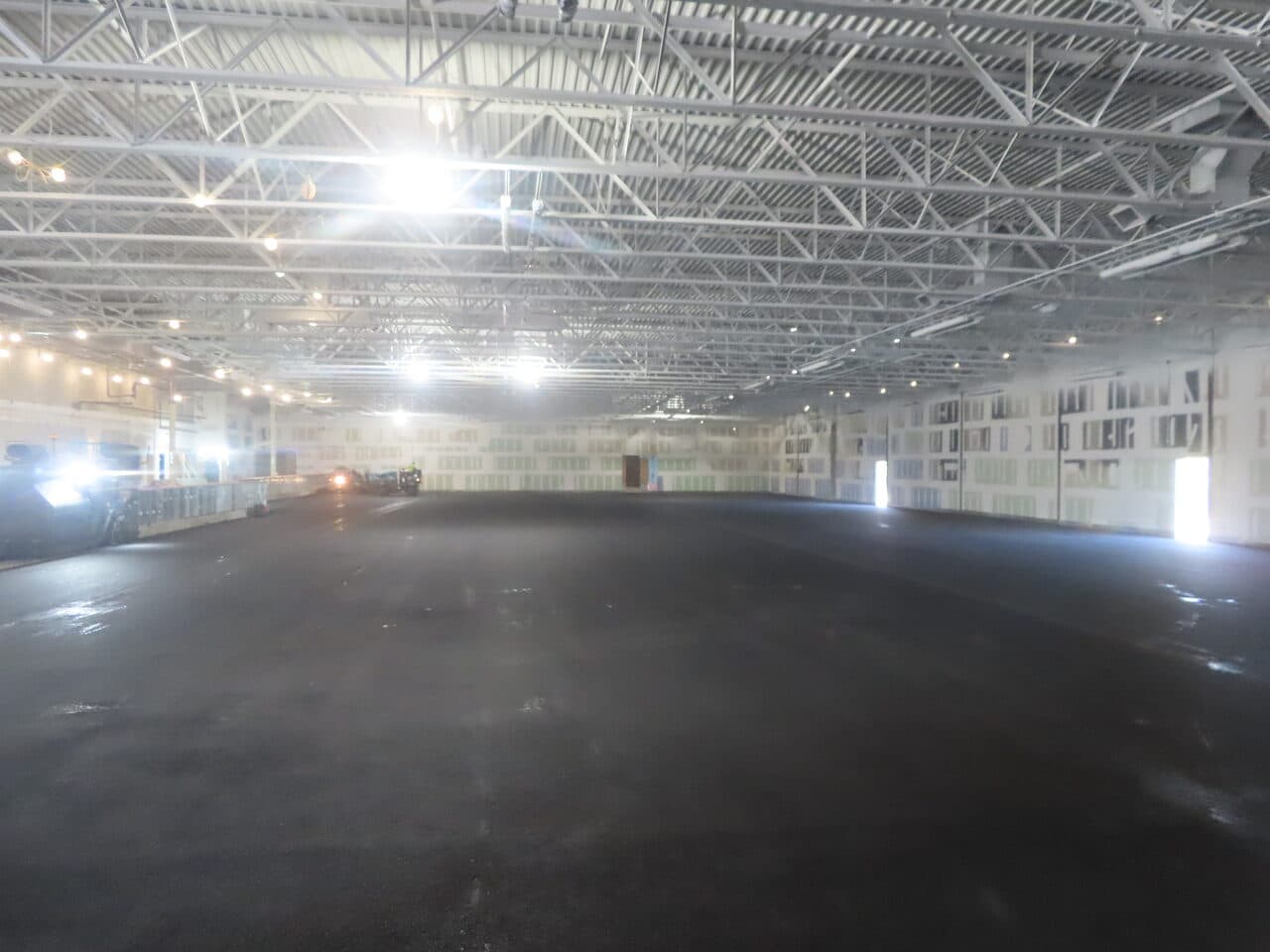 After — Commercial Parking Lot Paving in Newport, RI (empty interior dirt subgrade before paving)