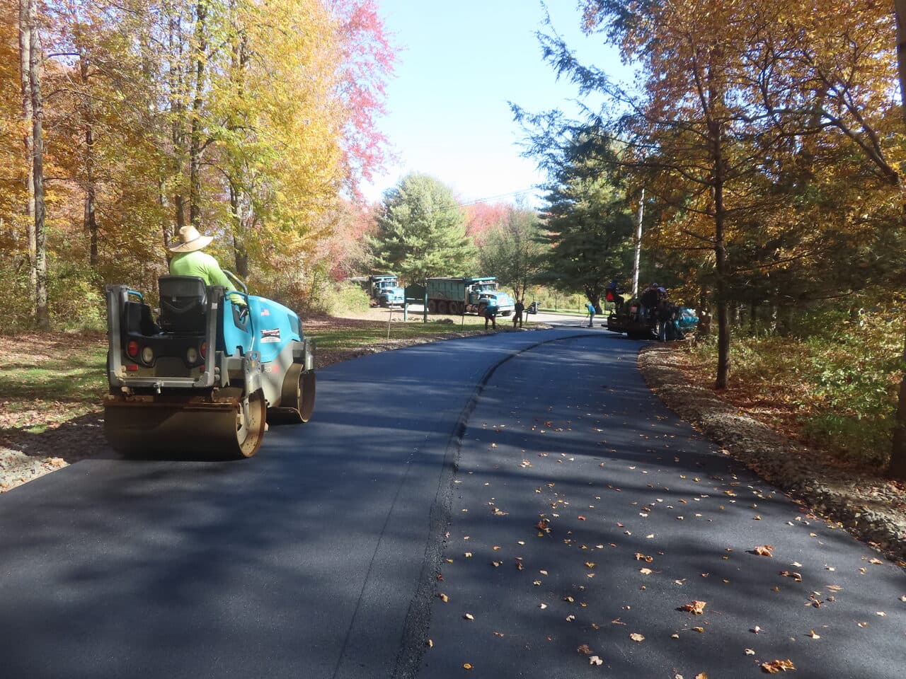Roadway Paving project in Wallingford, CT — roller compacting fresh asphalt road