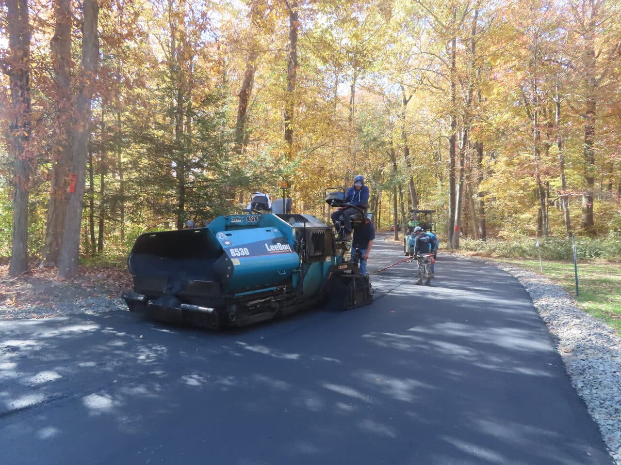 Roadway Paving project in Wallingford, CT — LeeBoy paver laying asphalt road