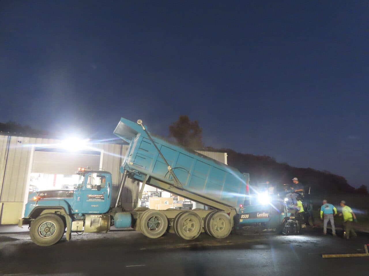Roadway Paving project in Wallingford, CT — night paving dump truck and paver