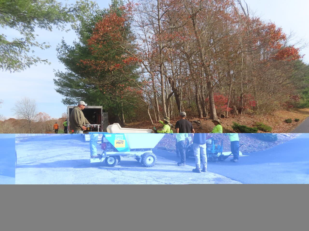Roadway Paving project in Durham, CT — paver laying asphalt on driveway